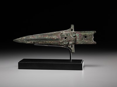 Lot 299 - A BRONZE ‘TIGER’ HALBERD BLADE, ZHONGHU GE, EASTERN ZHOU DYNASTY, WARRING STATES PERIOD
