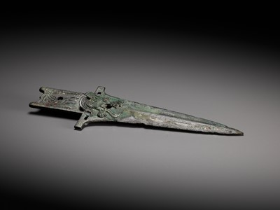 Lot 299 - A BRONZE ‘TIGER’ HALBERD BLADE, ZHONGHU GE, EASTERN ZHOU DYNASTY, WARRING STATES PERIOD