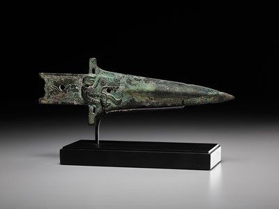 Lot 299 - A BRONZE ‘TIGER’ HALBERD BLADE, ZHONGHU GE, EASTERN ZHOU DYNASTY, WARRING STATES PERIOD