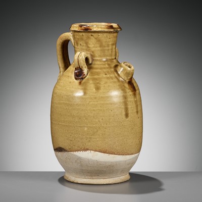 Lot 150 - AN IRON-SPLASHED AND AMBER-GLAZED EWER, TANG DYNASTY
