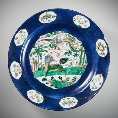 Lot 193 - A LARGE POWDER BLUE FAMILLE-VERTE ‘QILIN AND PHOENIX’ CHARGER, KANGXI PERIOD