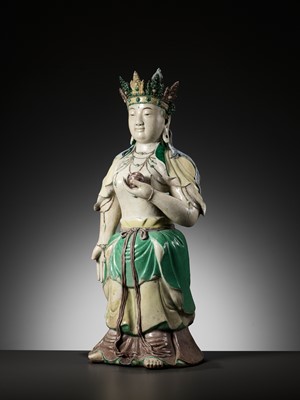Lot 80 - A LARGE FAMILLE VERTE BISCUIT FIGURE OF AMITAYUS, KANGXI PERIOD