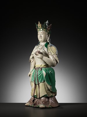 Lot 94 - A LARGE FAMILLE VERTE BISCUIT FIGURE OF AMITAYUS, KANGXI PERIOD