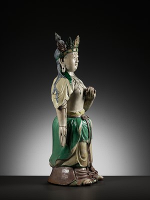 Lot 94 - A LARGE FAMILLE VERTE BISCUIT FIGURE OF AMITAYUS, KANGXI PERIOD