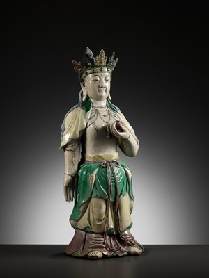 Lot 80 - A LARGE FAMILLE VERTE BISCUIT FIGURE OF AMITAYUS, KANGXI PERIOD