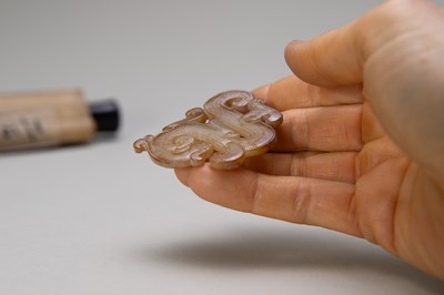 Lot 836 - A JADE ‘CHILONG’ PENDANT, EASTERN ZHOU DYNASTY