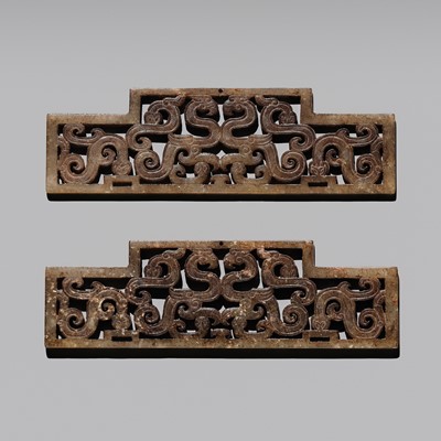 A PAIR OF OPENWORK PALE CELADON JADE ‘DOUBLE DRAGON’ PLAQUES, EASTERN ZHOU DYNASTY