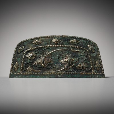 Lot 313 - A PARCEL-GILT AND SILVERED COPPER-ALLOY REPOUSSÉ COMB TOP, TANG DYNASTY