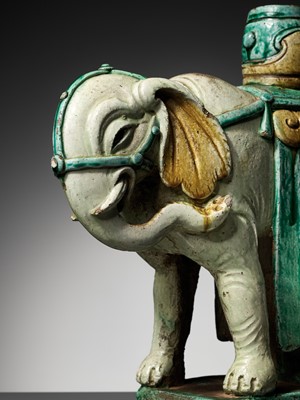 Lot 77 - A SANCAI-GLAZED ‘ELEPHANT’ CANDLEHOLDER, MING DYNASTY
