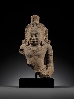 Lot 709 - A SANDSTONE BUST OF A DEMON, ASURA, ANGKOR PERIOD