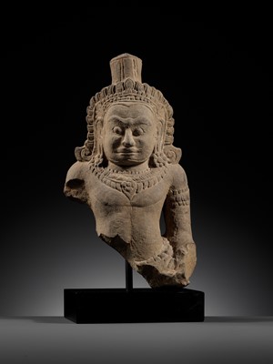 Lot 709 - A SANDSTONE BUST OF A DEMON, ASURA, ANGKOR PERIOD