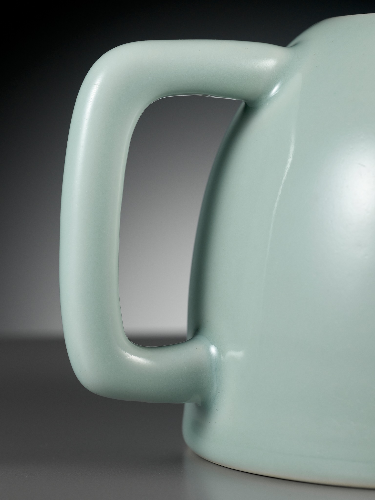 Lot 109 - A RARE CELADON-GLAZED TEAPOT, YONGZHENG MARK