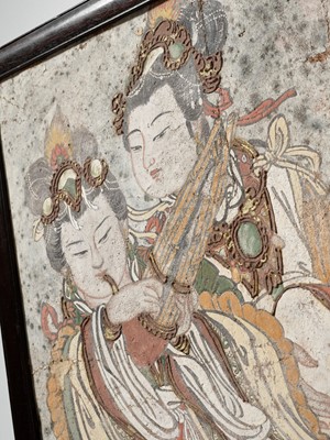 Lot 66 - A POLYCHROME STUCCO FRESCO FRAGMENT DEPICTING TWO CELESTIAL MUSICIANS, YUAN TO MING DYNASTY