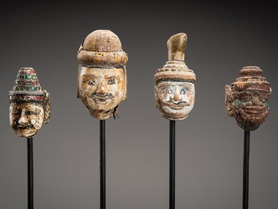 Lot 1517 - A GROUP OF FOUR BURMESE POLYCHROME WOOD PUPPET HEADS