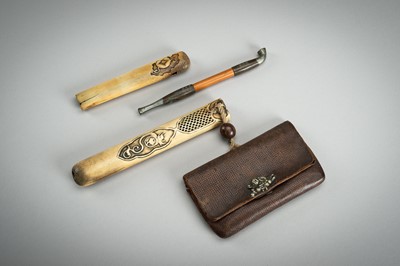 Lot 534 - A LOT WITH TWO KISERUZUTSU WITH POUCH AND TONKOTSU, EDO - MEIJI