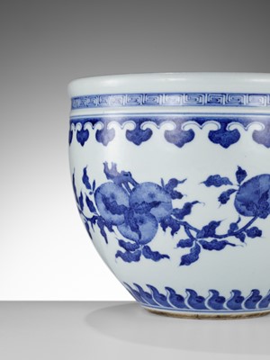 Lot 133 - A BLUE AND WHITE ‘AUSPICIOUS FRUITS’ JARDINIÈRE, CHINA, 18TH – 19TH CENTURY