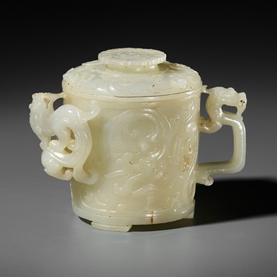 AN EXQUISITE PALE GREENISH-WHITE JADE ‘DRAGON’ FOOTED CUP AND COVER (ZHI), HAN DYNASTY