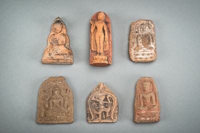 A GROUP OF SIX CLAY VOTIVE PLAQUES, 19TH CENTURY