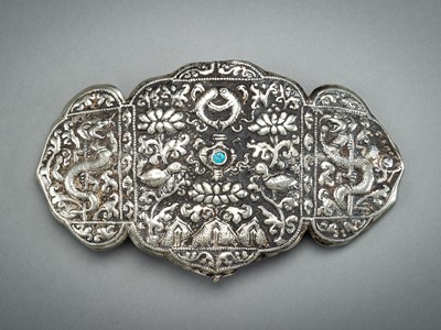 AN EMBOSSED TIBETAN SILVER PECTORAL, 19th CENTURY