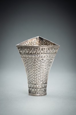 Lot 553 - A GROUP OF SIX EMBOSSED SILVER BETEL LEAF HOLDERS, c. 1900s