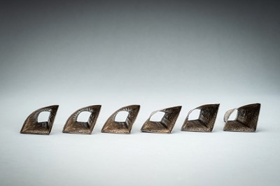 Lot 553 - A GROUP OF SIX EMBOSSED SILVER BETEL LEAF HOLDERS, c. 1900s