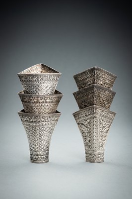 Lot 553 - A GROUP OF SIX EMBOSSED SILVER BETEL LEAF HOLDERS, c. 1900s