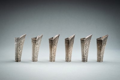 Lot 553 - A GROUP OF SIX EMBOSSED SILVER BETEL LEAF HOLDERS, c. 1900s