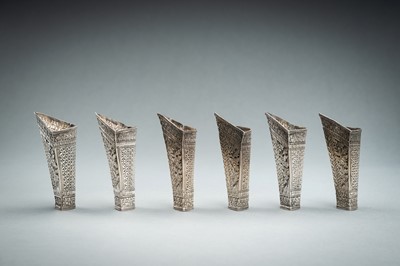 Lot 553 - A GROUP OF SIX EMBOSSED SILVER BETEL LEAF HOLDERS, c. 1900s