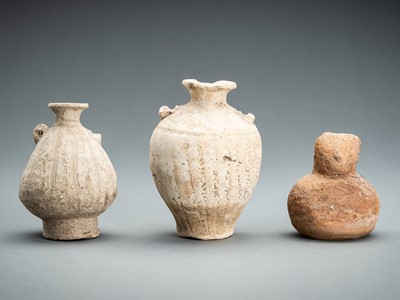 A GROUP OF THREE ANCIENT POTTERY VESSELS