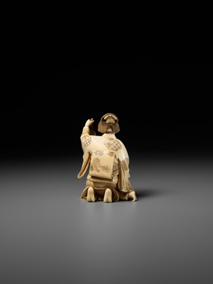 Lot 167 - TAIMIN: AN IVORY OKIMONO OF A MOTHER AND CHILD