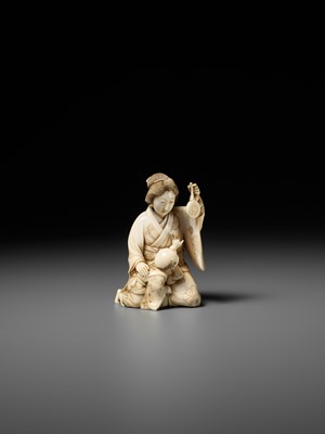 Lot 167 - TAIMIN: AN IVORY OKIMONO OF A MOTHER AND CHILD