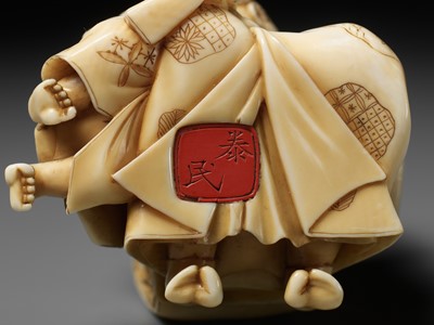 Lot 167 - TAIMIN: AN IVORY OKIMONO OF A MOTHER AND CHILD