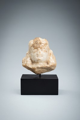A SMALL MARBLE HEAD OF A FEMALE DEITY, KASHMIR, 10TH-12TH CENTURY