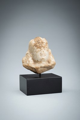 A SMALL MARBLE HEAD OF A FEMALE DEITY, KASHMIR, 10TH-12TH CENTURY