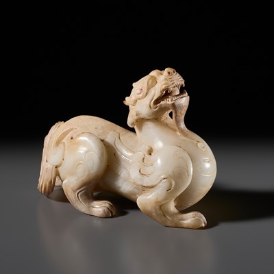 AN EXTRAORDINARY WHITE JADE FIGURE OF A BIXIE, HAN DYNASTY