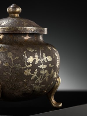 Lot 157 - A PARCEL-GILT SILVER TRIPOD JAR AND COVER, TANG DYNASTY