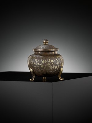 Lot 157 - A PARCEL-GILT SILVER TRIPOD JAR AND COVER, TANG DYNASTY