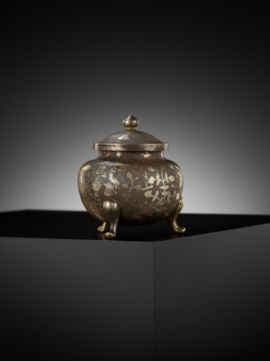 Lot 157 - A PARCEL-GILT SILVER TRIPOD JAR AND COVER, TANG DYNASTY