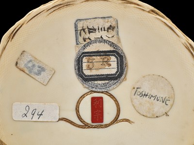 Lot 296 - TOSHIMUNE: A FINE IVORY OKIMONO DEPICTING A RESTING FLOWER SELLER