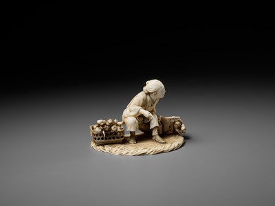 Lot 296 - TOSHIMUNE: A FINE IVORY OKIMONO DEPICTING A RESTING FLOWER SELLER