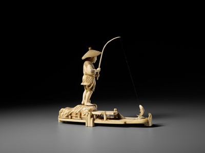 Lot 282 - SEISHU: A RARE IVORY OKIMONO OF A FISHERMAN REELING IN A FISH