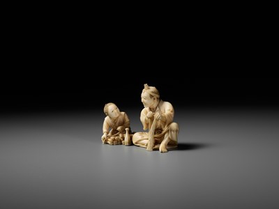 Lot 162 - HIROYUKI: AN IVORY OKIMONO OF A WOODCUTTER WITH CHILD