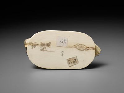 Lot 141 - KOGETSU: A FINE IVORY OKIMONO OF A HUNTER SNARING A CRANE