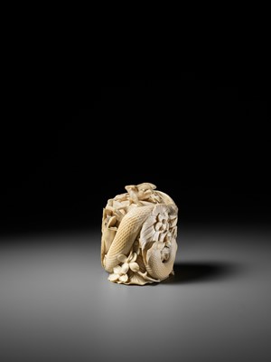 Lot 272 - TANAKA REIGYOKU: A FINE IVORY TUSK BOX AND COVER DEPICTING A SNAKE EATING A SPARROW