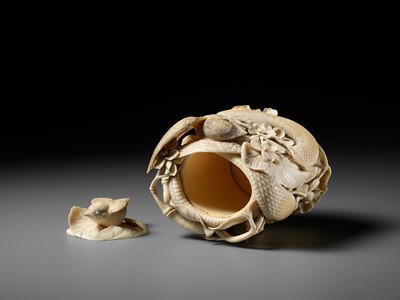 Lot 272 - TANAKA REIGYOKU: A FINE IVORY TUSK BOX AND COVER DEPICTING A SNAKE EATING A SPARROW