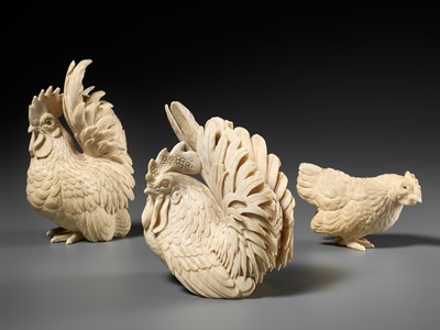 Lot 152 - A GROUP OF IVORY OKIMONO DEPICTING ROOSTERS WITH HEN