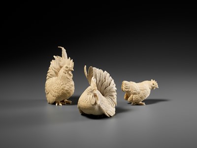 Lot 152 - A GROUP OF IVORY OKIMONO DEPICTING ROOSTERS WITH HEN