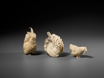 Lot 152 - A GROUP OF IVORY OKIMONO DEPICTING ROOSTERS WITH HEN