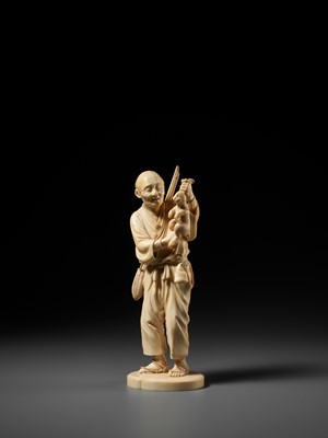 Lot 138 - KOSEI: A FINE TOKYO SCHOOL IVORY OKIMONO OF A HUNTER HOLDING A HARE