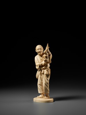 Lot 138 - KOSEI: A FINE TOKYO SCHOOL IVORY OKIMONO OF A HUNTER HOLDING A HARE